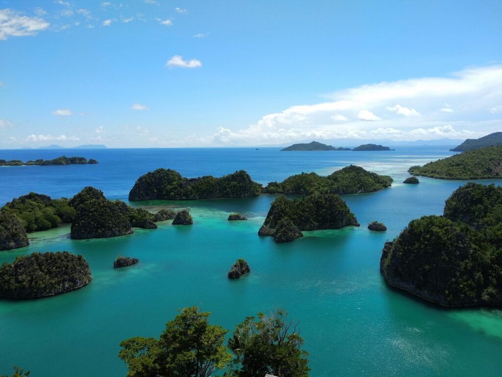 Explore the breathtaking beauty of Piaynemo's islands in Raja Ampat, West Papua, Indonesia.